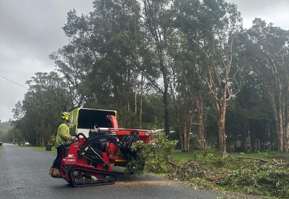 Truck and wood chipper on a tree-clearing job